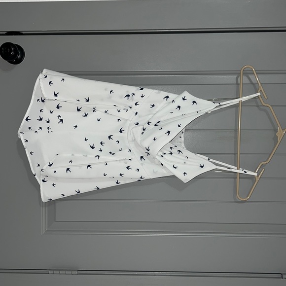 White and navy blue jumpsuit. - Picture 1 of 2